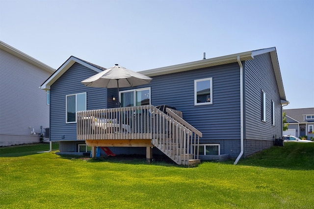 16621 Goodman Dr, Urbandale, IA 50323 - back of house featuring a lawn, a deck, and stairway