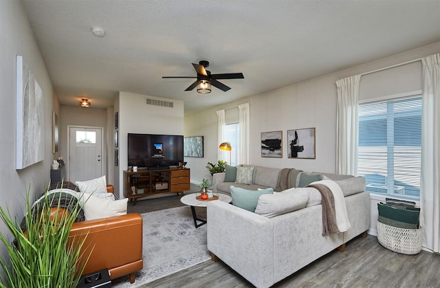 16621 Goodman Dr, Urbandale, IA 50323 - living room with wood finished floors and ceiling fan