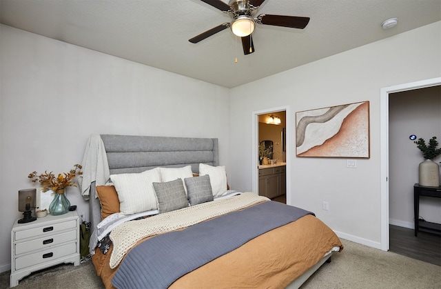 16621 Goodman Dr, Urbandale, IA 50323 - carpeted bedroom featuring ensuite bathroom and a ceiling fan