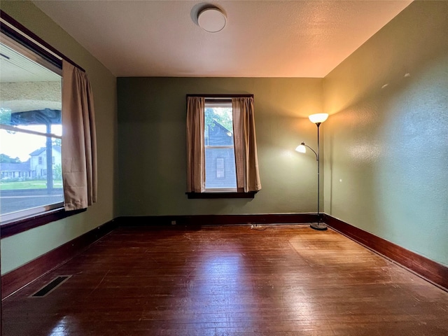 400 W Salem Ave, Indianola, IA 50125 - empty room with hardwood / wood-style flooring and baseboards