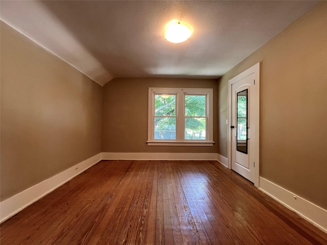 400 W Salem Ave, Indianola, IA 50125 - additional living space with dark wood finished floors and lofted ceiling