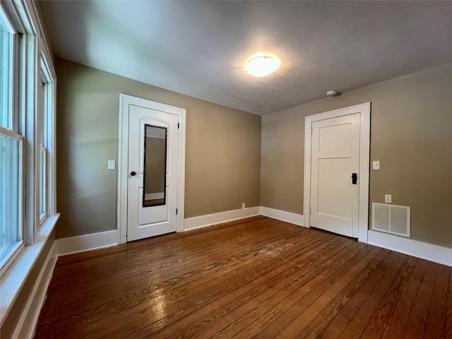 400 W Salem Ave, Indianola, IA 50125 - spare room with dark wood finished floors and baseboards