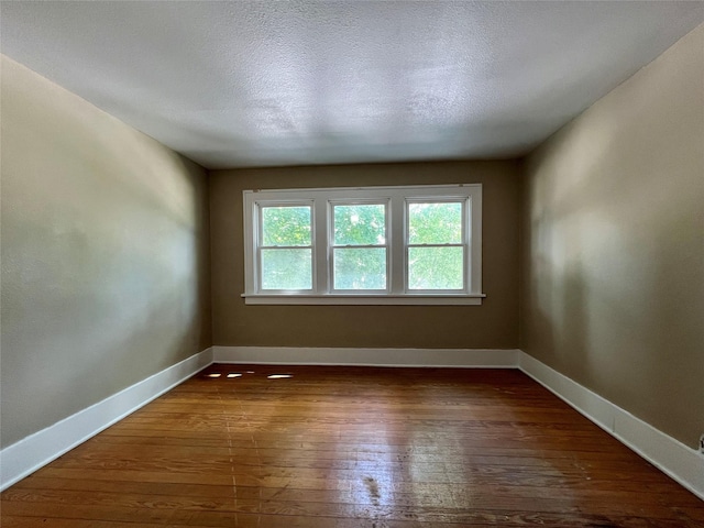 400 W Salem Ave, Indianola, IA 50125 - spare room featuring hardwood / wood-style floors and baseboards