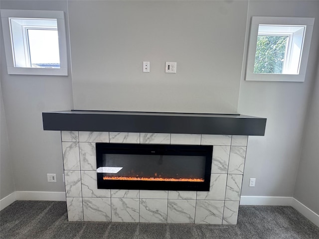 10009 Powell Ave, Johnston, IA 50131 - detailed view of a tile fireplace and carpet
