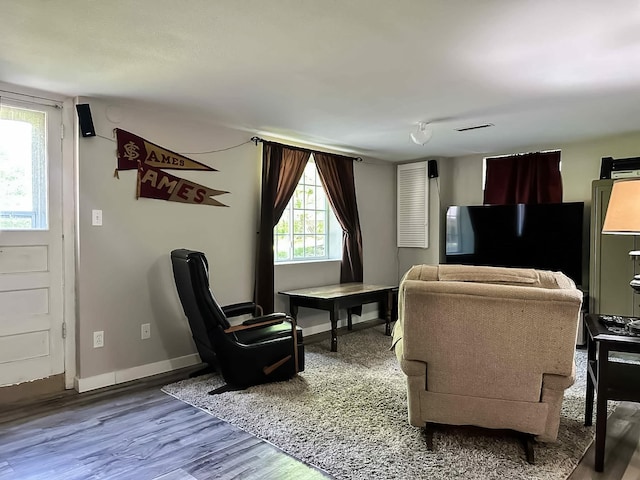 424 Hilltop Rd, Ames, IA 50014 - living area featuring wood finished floors and baseboards