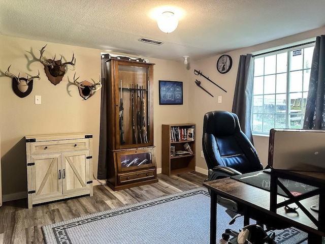 424 Hilltop Rd, Ames, IA 50014 - office space featuring wood finished floors and a textured ceiling