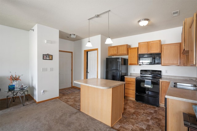 1815 SW White Birch Cir Unit 3, Ankeny, IA 50023 - kitchen featuring black appliances, a center island, light countertops, and hanging light fixtures