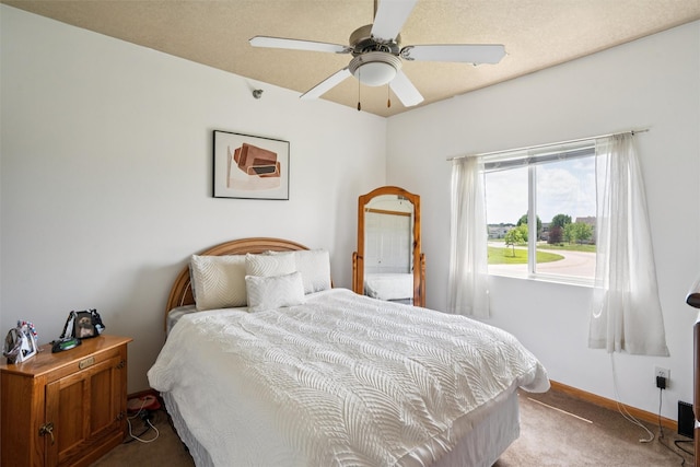 1815 SW White Birch Cir Unit 3, Ankeny, IA 50023 - carpeted bedroom with baseboards and a ceiling fan