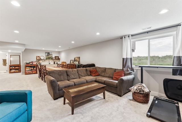 1819 8th Ave SE, Altoona, IA 50009 - living room featuring light carpet and recessed lighting