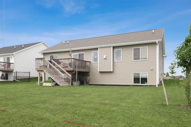 1819 8th Ave SE, Altoona, IA 50009 - back of property featuring a wooden deck, a lawn, and stairs