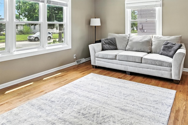 3832 Richmond Ave, Des Moines, IA 50317 - living area featuring plenty of natural light and wood finished floors