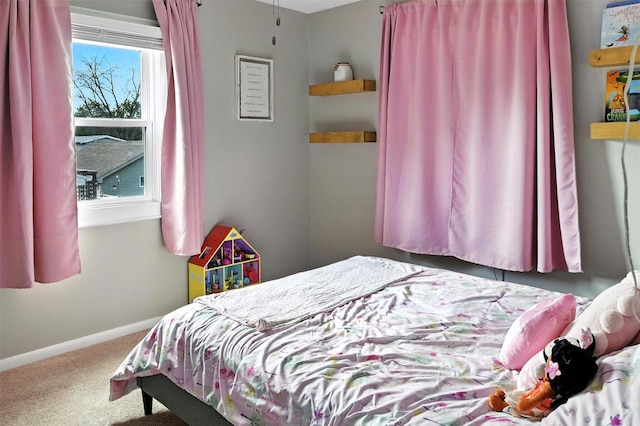 3832 Richmond Ave, Des Moines, IA 50317 - carpeted bedroom featuring baseboards