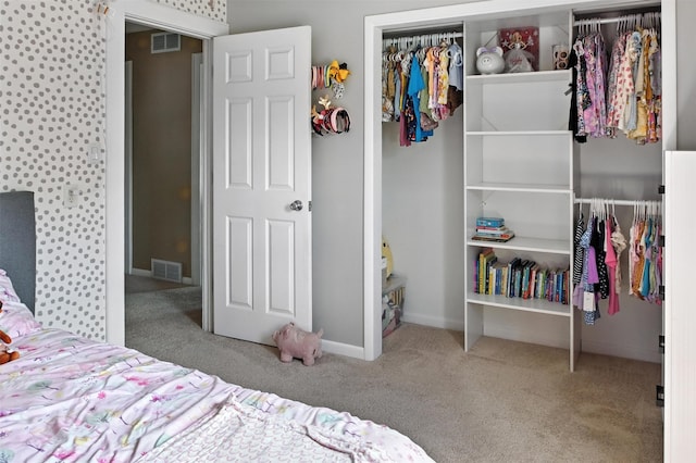 3832 Richmond Ave, Des Moines, IA 50317 - carpeted bedroom featuring a closet and baseboards
