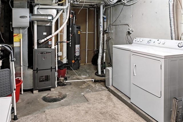 3832 Richmond Ave, Des Moines, IA 50317 - unfinished below grade area featuring gas water heater, washing machine and clothes dryer, and heating unit