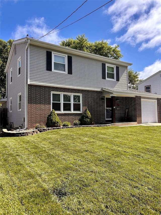 3832 Richmond Ave, Des Moines, IA 50317 - view of front facade with an attached garage, brick siding, and a front yard