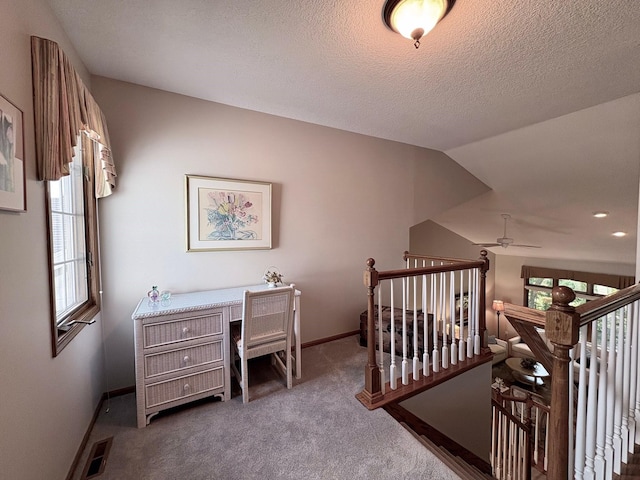 8844 Meredith Dr, Urbandale, IA 50322 - office area featuring ceiling fan and carpet floors