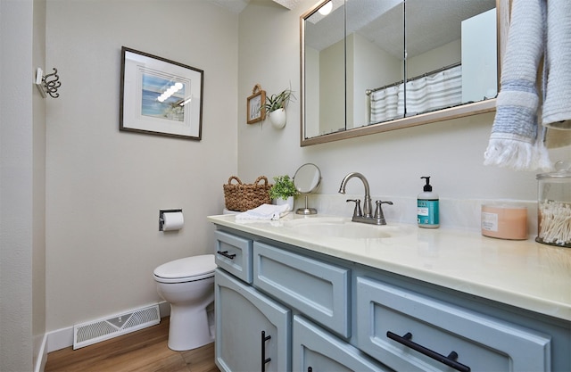 1506 S 14th St, Adel, IA 50003 - bathroom with wood finished floors and vanity