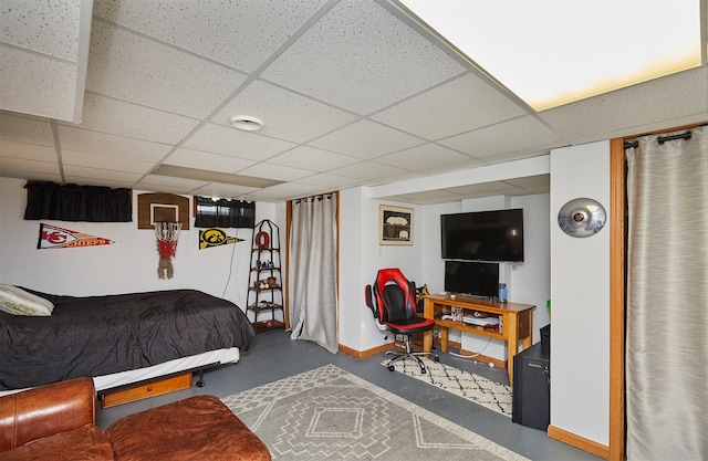1506 S 14th St, Adel, IA 50003 - bedroom with concrete floors and a paneled ceiling