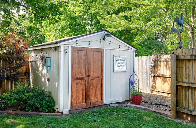 1506 S 14th St, Adel, IA 50003 - view of shed featuring a fenced backyard