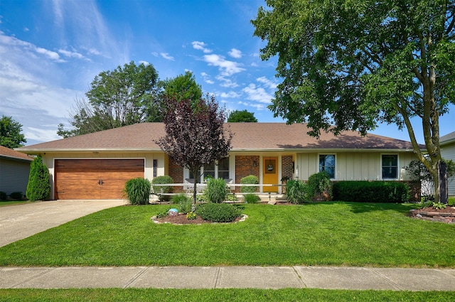 1506 S 14th St, Adel, IA 50003 - ranch-style home featuring an attached garage, a front lawn, concrete driveway, covered porch, and board and batten siding