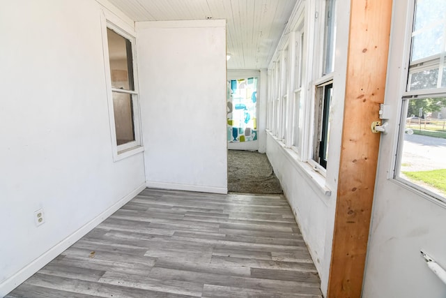 603 W Church St, Marshalltown, IA 50158 - unfurnished sunroom with wood finished floors and wood ceiling