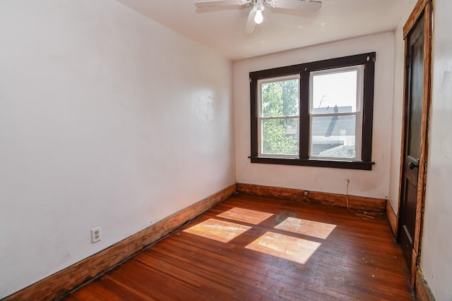 603 W Church St, Marshalltown, IA 50158 - spare room featuring hardwood / wood-style floors and a ceiling fan