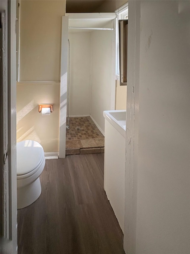 2826 Oxford St, Des Moines, IA 50313 - bathroom with wood finished floors and vanity