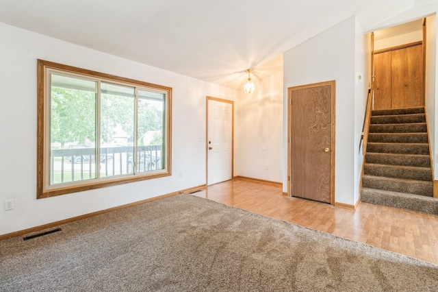 3612 SE 18th Ct, Des Moines, IA 50320 - entrance foyer featuring carpet and stairs