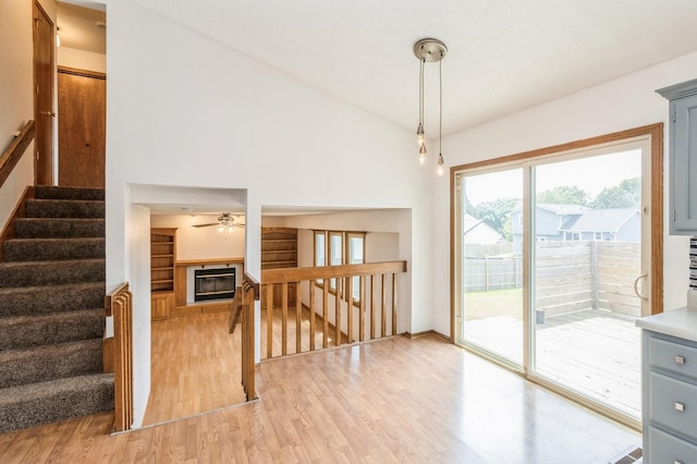 3612 SE 18th Ct, Des Moines, IA 50320 - stairs with wood finished floors and ceiling fan