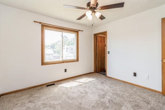 3612 SE 18th Ct, Des Moines, IA 50320 - spare room with carpet flooring and a ceiling fan