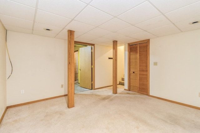 3612 SE 18th Ct, Des Moines, IA 50320 - finished below grade area with a drop ceiling, carpet floors, and stairs