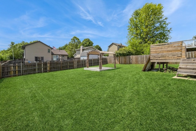 3612 SE 18th Ct, Des Moines, IA 50320 - fenced backyard with a patio area