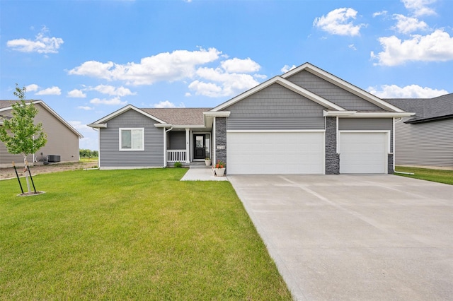 2708 NW Boulder Point Pl, Ankeny, IA 50023 - view of front facade with a garage, a front lawn, and concrete driveway