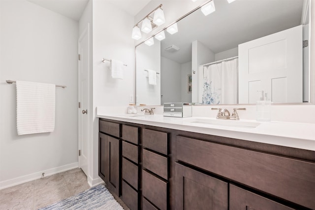 2708 NW Boulder Point Pl, Ankeny, IA 50023 - full bath with double vanity and baseboards