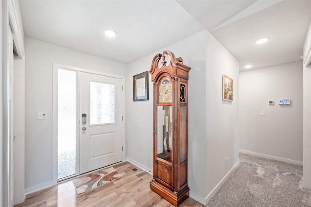 2708 NW Boulder Point Pl, Ankeny, IA 50023 - entryway with recessed lighting and light wood-style floors
