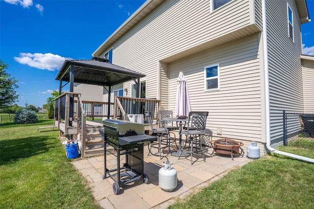 303 SE 14th St, Grimes, IA 50111 - view of patio featuring an outdoor fire pit, a gazebo, a grill, and a deck