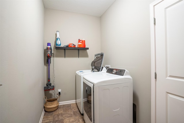303 SE 14th St, Grimes, IA 50111 - washroom featuring independent washer and dryer and baseboards