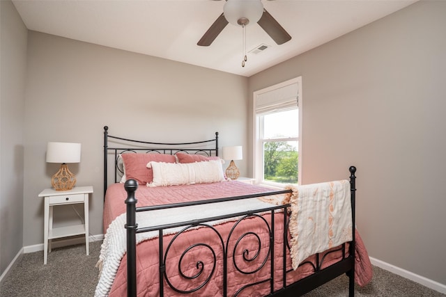 303 SE 14th St, Grimes, IA 50111 - carpeted bedroom with baseboards and ceiling fan
