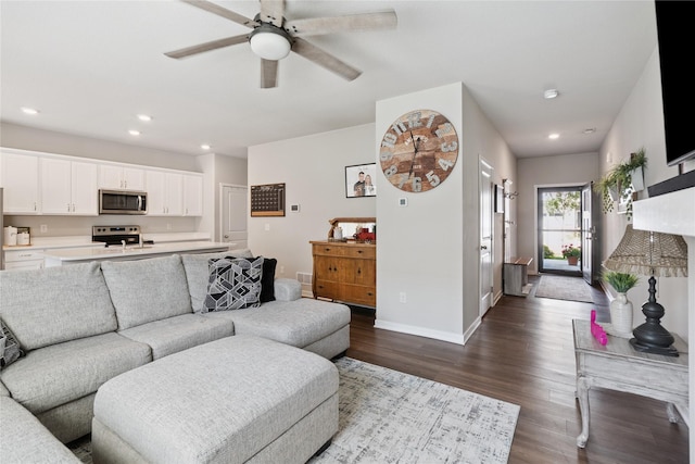 3213 NW Linwood Ln, Ankeny, IA 50023 - living area with a ceiling fan, dark wood-style flooring, and recessed lighting