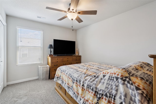 3213 NW Linwood Ln, Ankeny, IA 50023 - carpeted bedroom with baseboards and ceiling fan