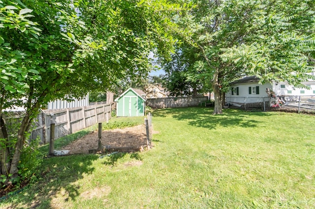3935 8th St, Des Moines, IA 50313 - fenced backyard featuring a storage shed