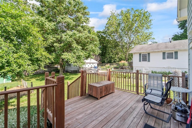 3935 8th St, Des Moines, IA 50313 - wooden deck with a fenced backyard