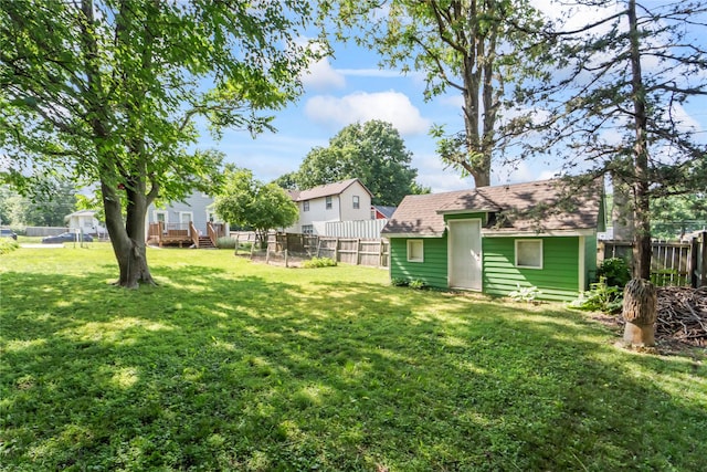 3935 8th St, Des Moines, IA 50313 - fenced backyard featuring a deck