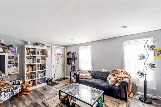 3935 8th St, Des Moines, IA 50313 - living room with wood finished floors and baseboards