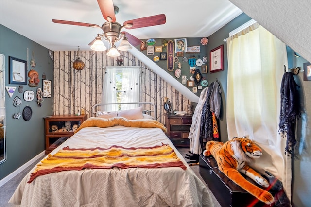 3935 8th St, Des Moines, IA 50313 - bedroom featuring a ceiling fan and carpet flooring