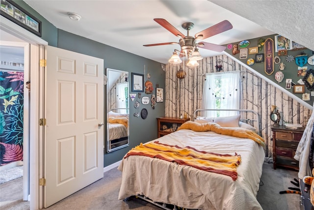 3935 8th St, Des Moines, IA 50313 - carpeted bedroom featuring ceiling fan and baseboards