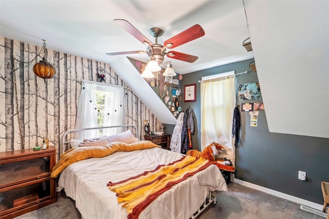 3935 8th St, Des Moines, IA 50313 - carpeted bedroom with baseboards and ceiling fan