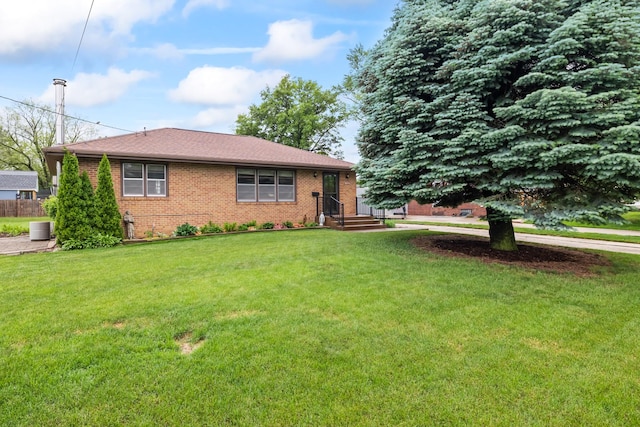 1232 Carrie Ave, Des Moines, IA 50315 - view of front of house with brick siding and a front lawn