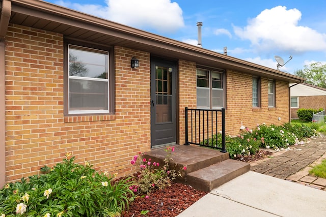 1232 Carrie Ave, Des Moines, IA 50315 - property entrance featuring brick siding