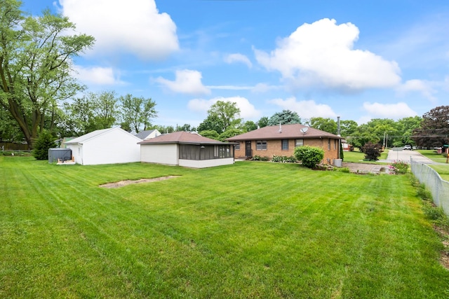 1232 Carrie Ave, Des Moines, IA 50315 - view of yard with a sunroom